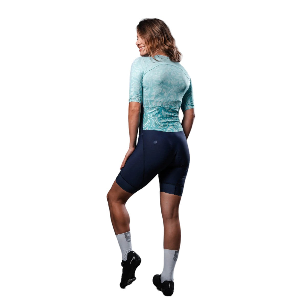 Macaquinho Triathlon com manga Woom 140 Feminino 2024