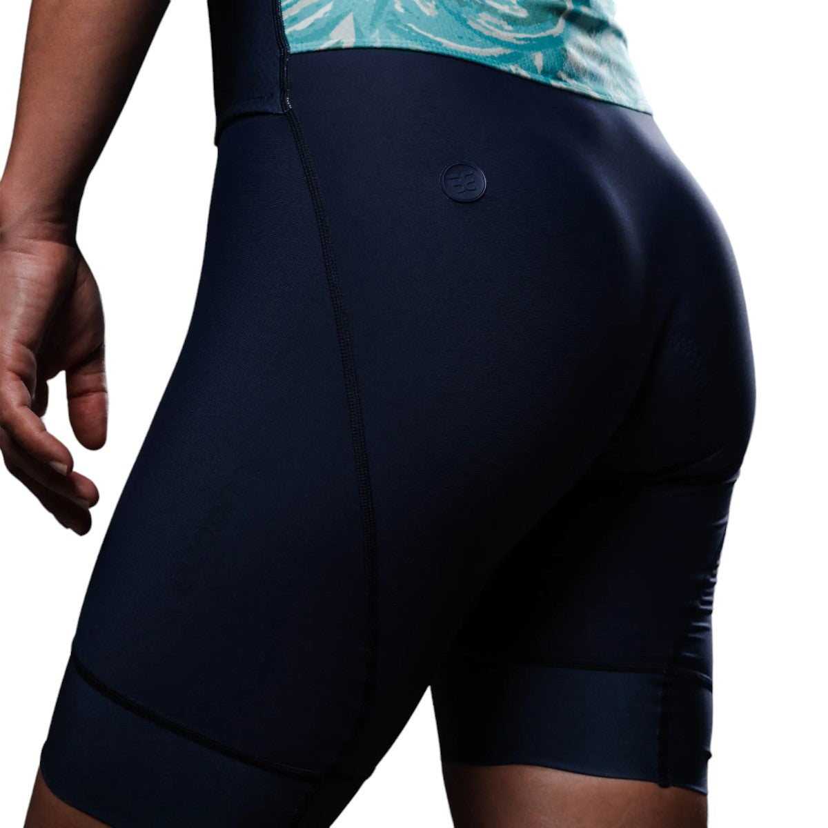 Macaquinho Triathlon com manga Woom 140 Feminino 2024