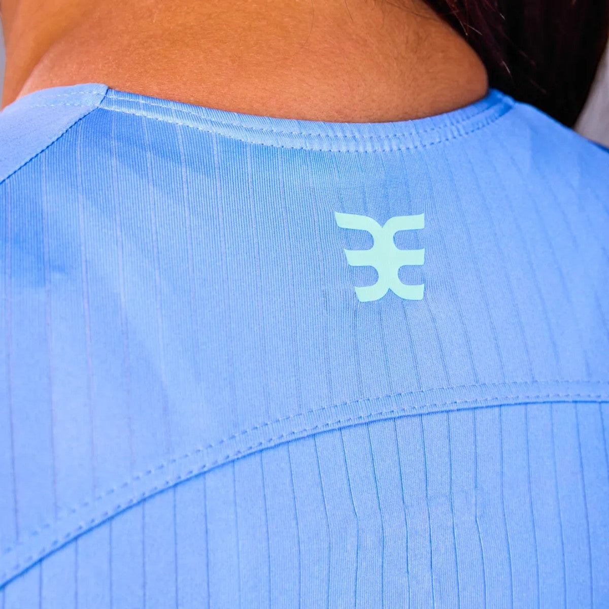 Macaquinho Triathlon com manga  Woom 140 Feminino II